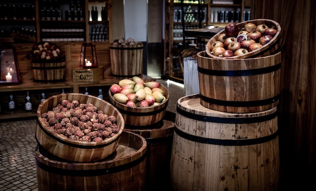 Brown Wooden Barrels in basement