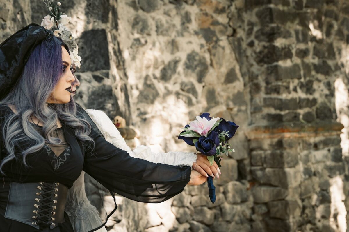 women-in-black-and-white-halloween-costumes-holding-a-bouquet